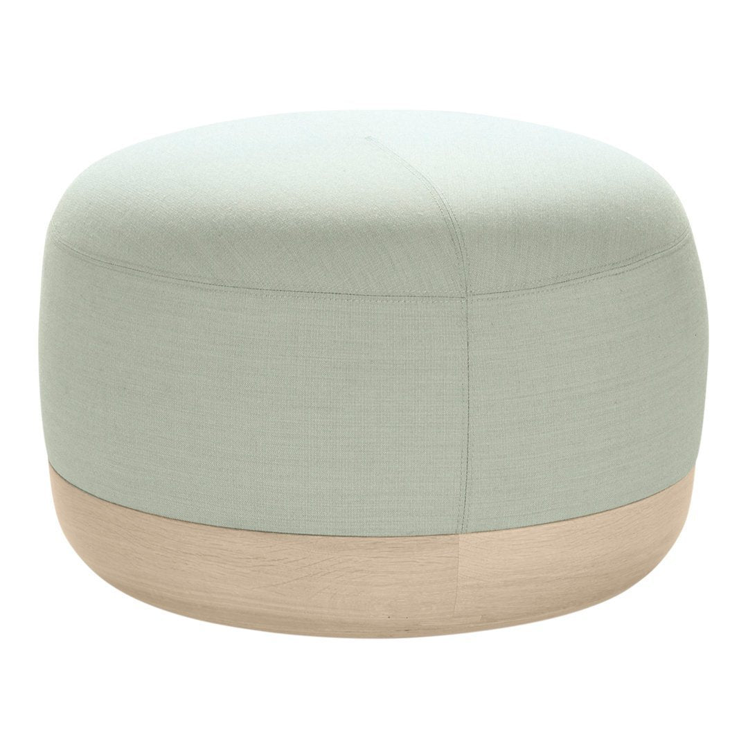 Soft mint green pouf with a light wood base, featuring a smooth, seamless texture and minimalist design.