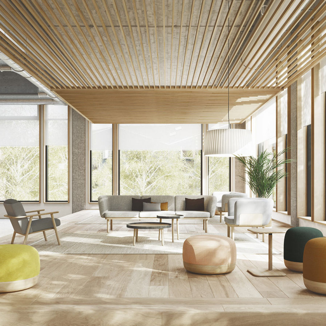 Modern living space featuring neutral tones, soft pastels, and a mix of natural wood and colorful accent furniture.