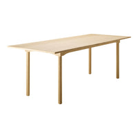 Light wood dining table with a smooth, natural finish and simple, elegant design. Perfect for modern interiors.