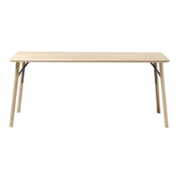 Light wood table with a smooth surface and natural finish, featuring clean lines and sturdy black metal legs.