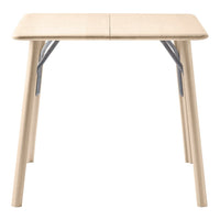 Light beige folding table with smooth surface and metallic gray accents on the legs, ideal for versatile setups.