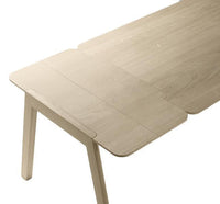 Light oakwood dining table with a smooth finish and subtle grain patterns. Perfect for modern interiors.