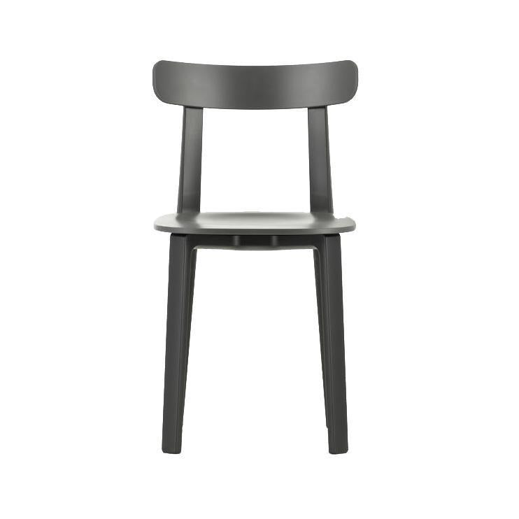 Stylish black chair with a sleek design and minimalist pattern, perfect for modern interiors. 