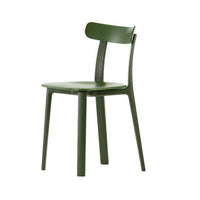 Modern green chair with a minimalist design and smooth finish, perfect for contemporary decor.