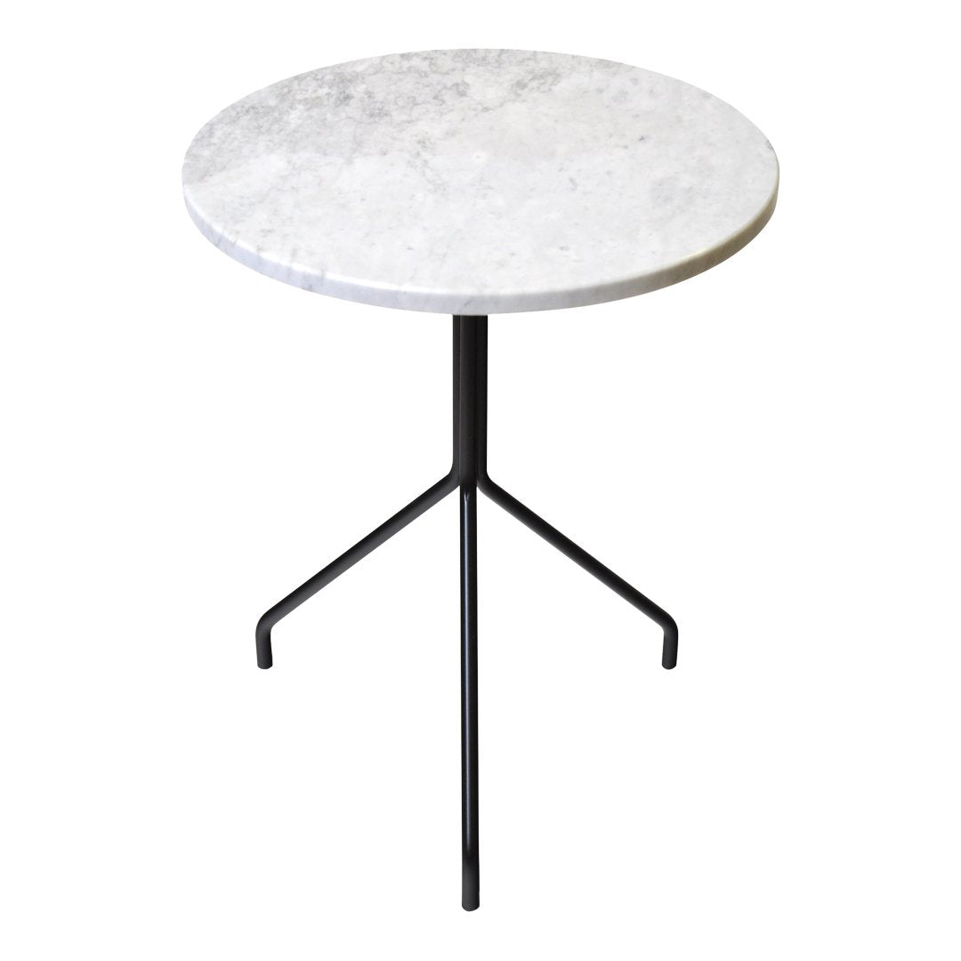 Round marble table with a smooth white top and a sleek black tripod base. Minimalist design with elegant texture.