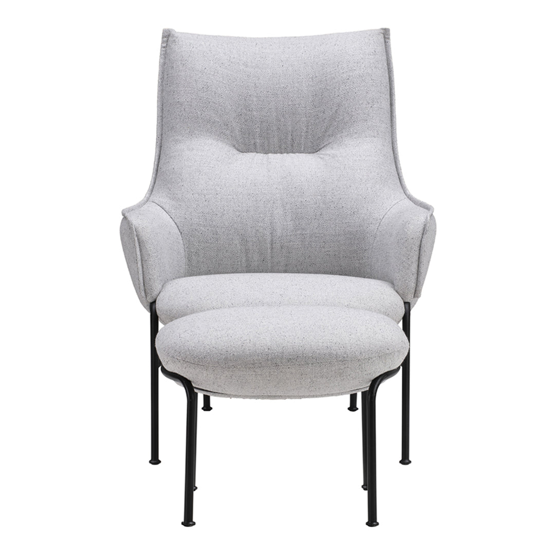 Stylish grey upholstered chair with a textured finish and sleek black metal legs, perfect for modern interiors.