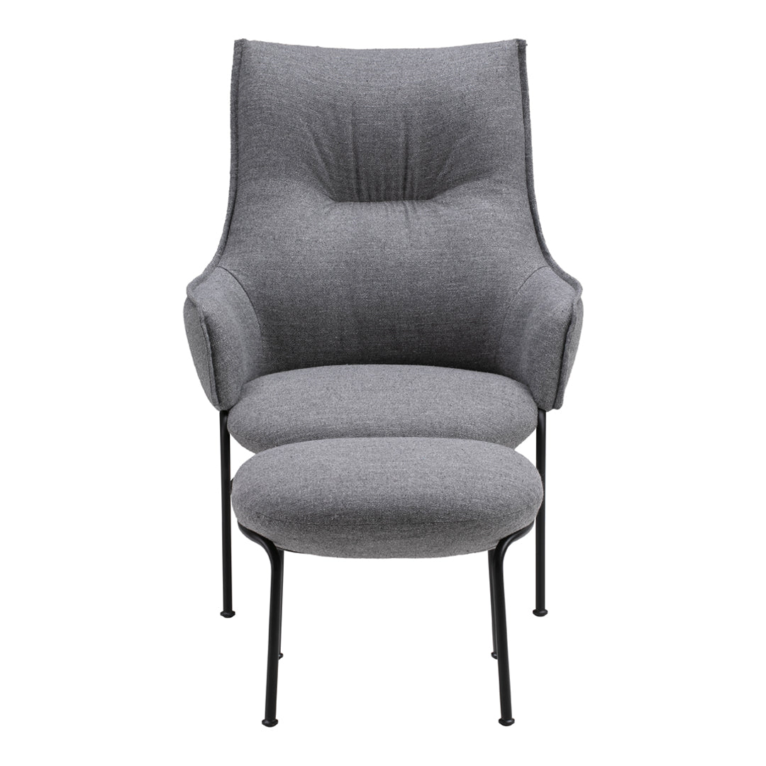 Contemporary gray upholstered chair with a soft, textured fabric and sleek black metal legs.