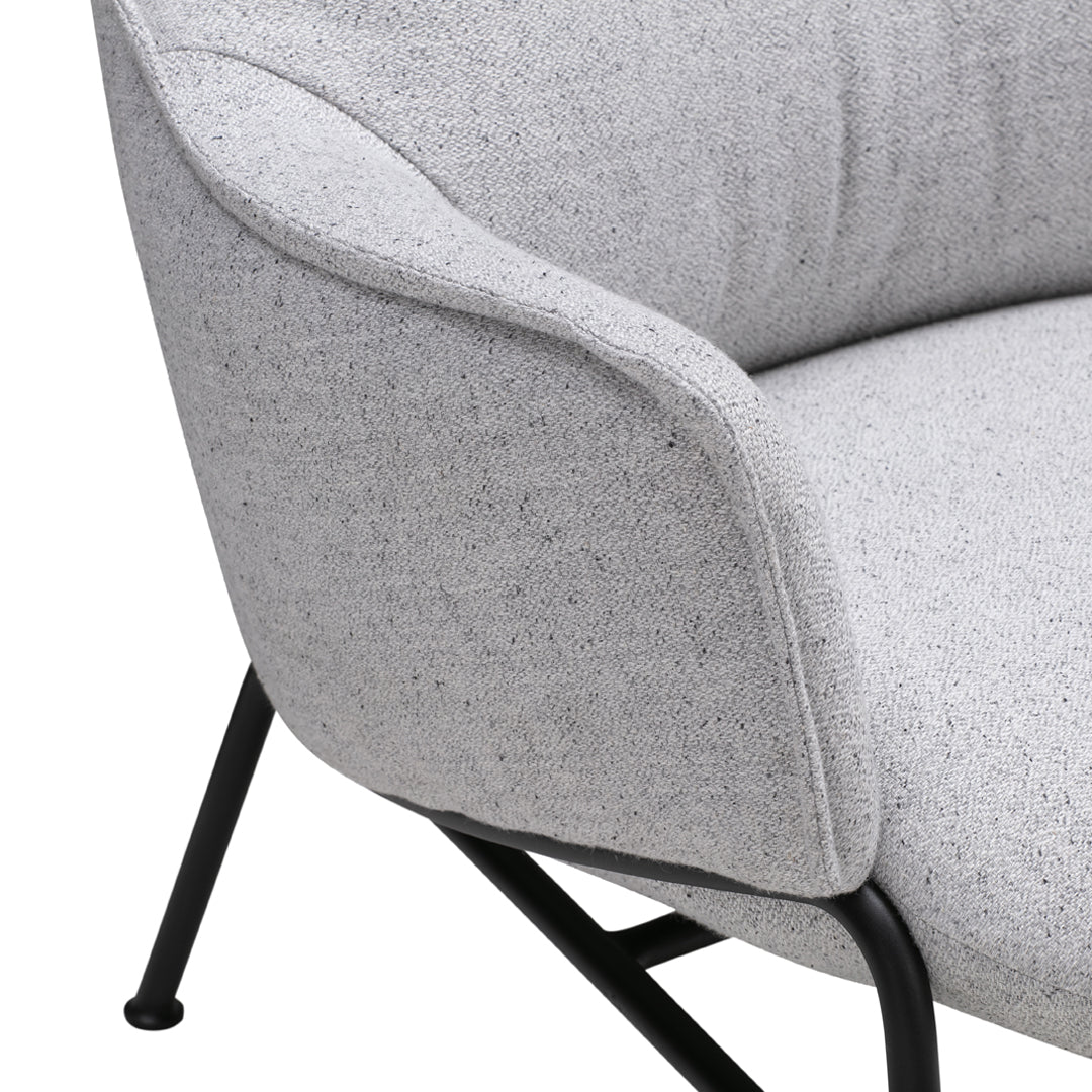Gray textured upholstery with a sleek black metal frame for a modern look. Perfect for contemporary interiors.