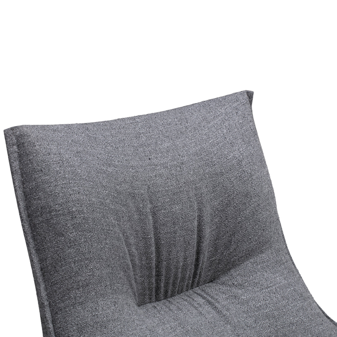 Gray fabric chair with subtle heather texture and soft, modern contour design. Perfect for contemporary decor.