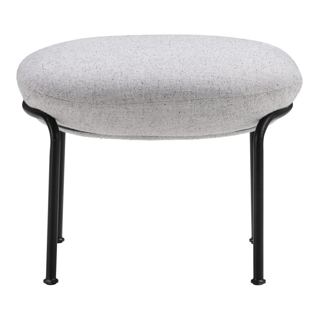 Round gray upholstered ottoman with a textured fabric and sleek black metal legs. Perfect for modern decor.