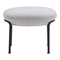 Round gray upholstered ottoman with a textured fabric and sleek black metal legs. Perfect for modern decor.