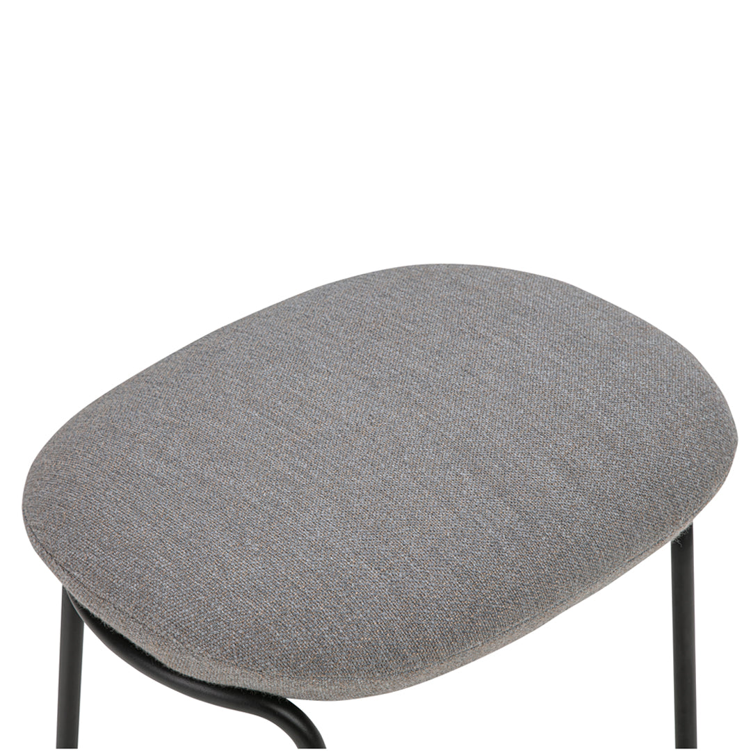 Gray upholstered chair cushion with a textured pattern, set on a sleek black metal frame. Ideal for modern decor.