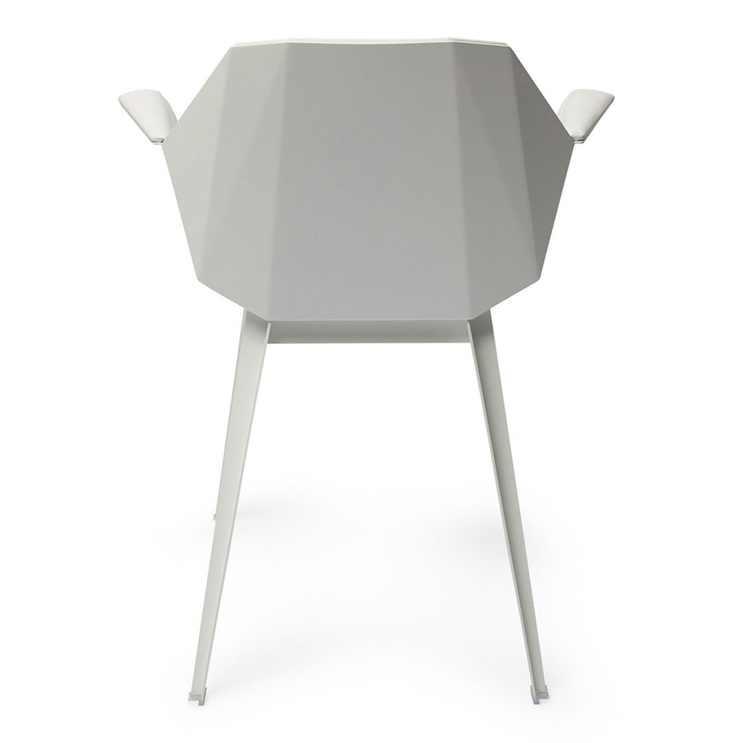 Stylish geometric chair in a sleek light gray finish with clean angles and minimalistic design. Perfect for modern decor.