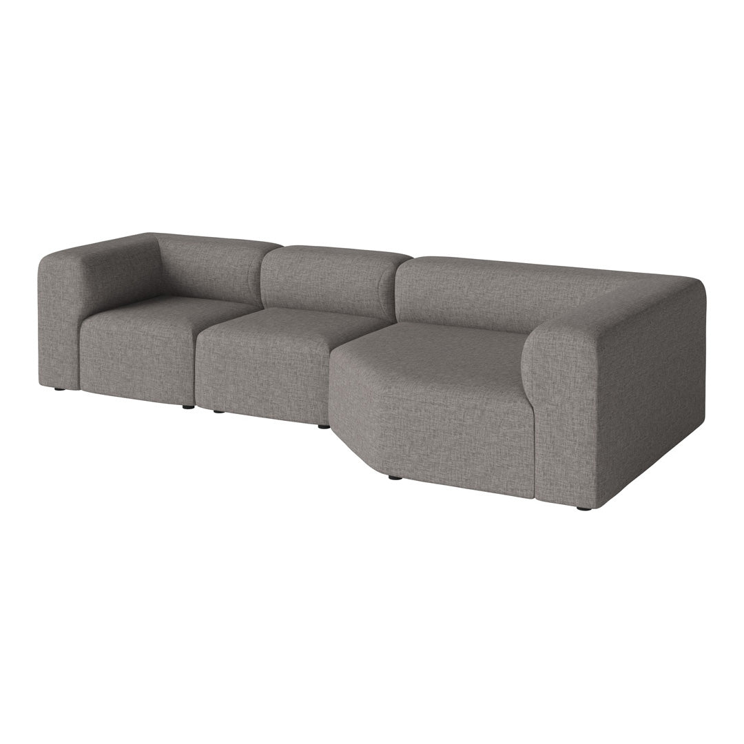 Grey modular sofa with smooth fabric and modern design, featuring a solid color and subtle texture.