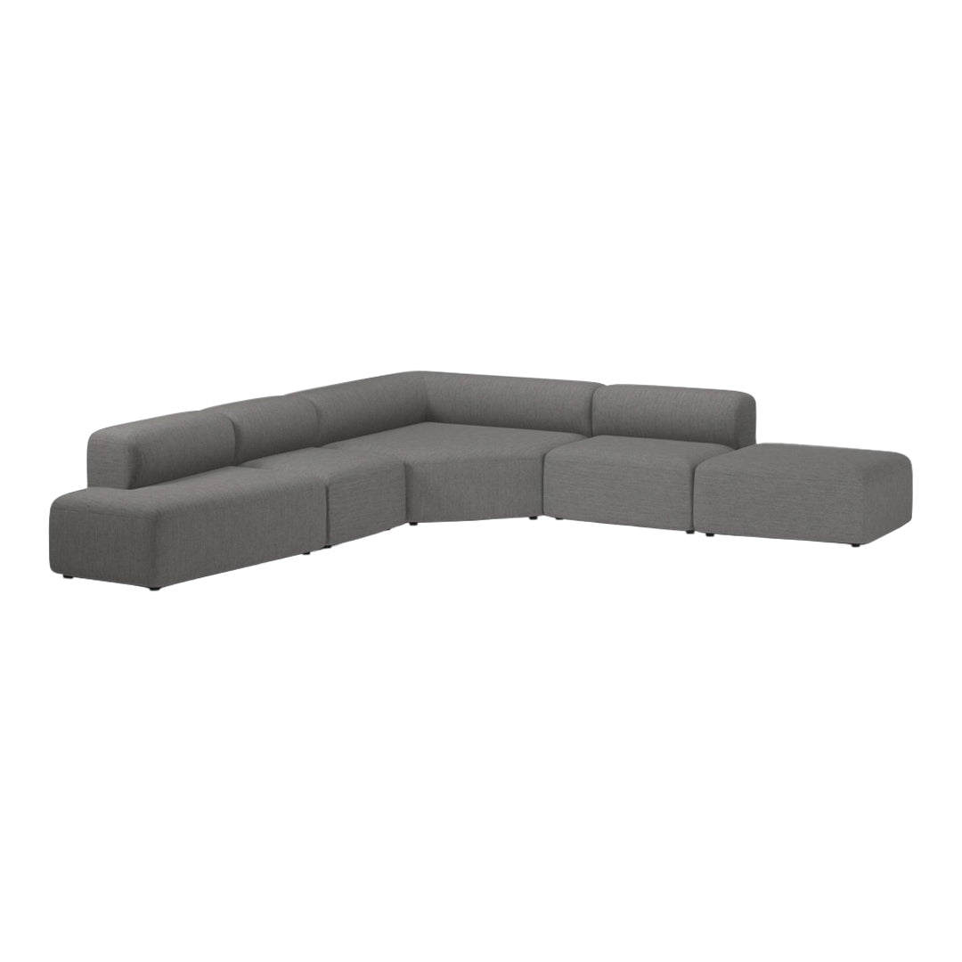 Gray sectional sofa with a modern, minimalist design and clean lines, featuring a solid color fabric upholstery.