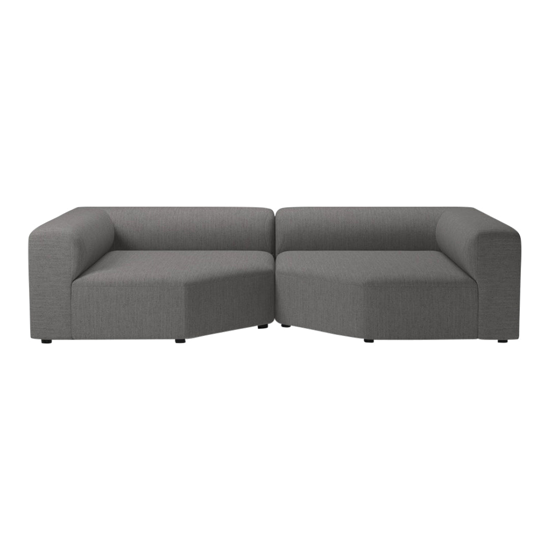 Gray sectional sofa with a minimalist design and clean lines, featuring a solid patterned upholstery.