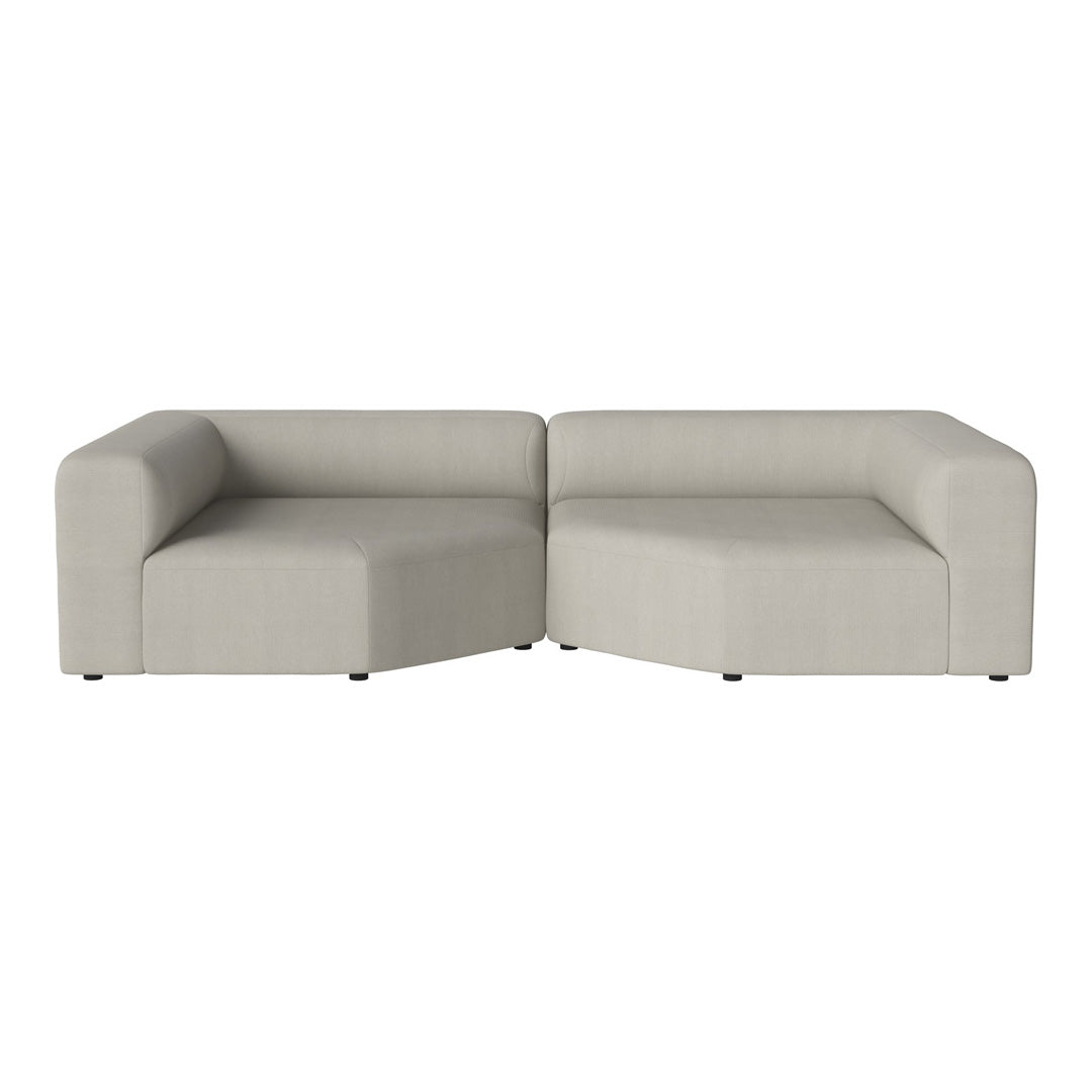 Light gray modular sofa with a minimalist design and smooth, textured fabric. Perfect for modern living spaces.