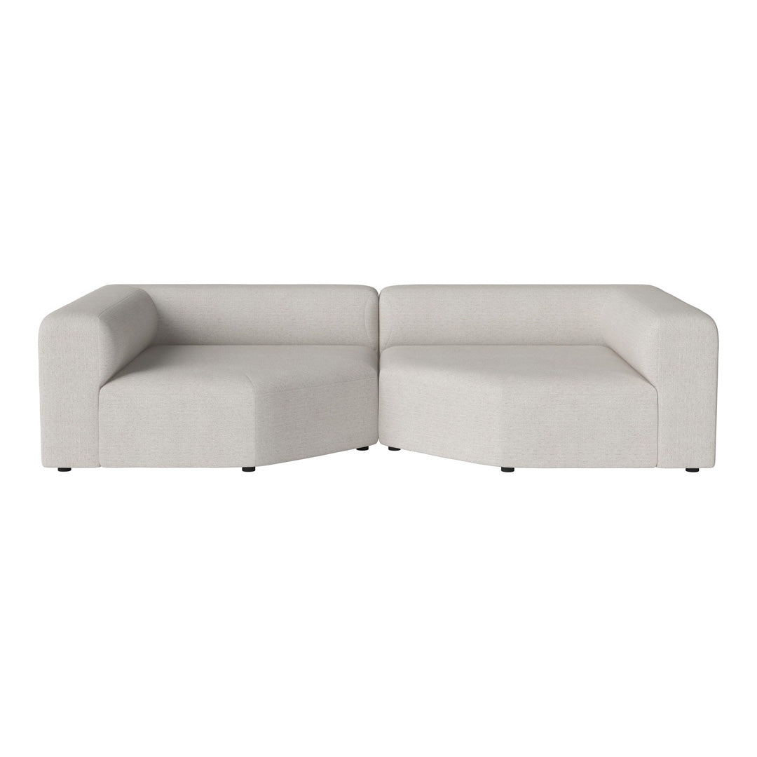 Light beige modular sofa with smooth, solid fabric and modern, minimalist design. Perfect for contemporary spaces.