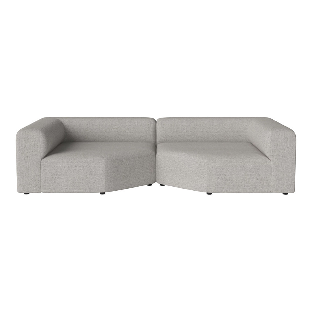 Light gray sectional sofa with a minimalist design and smooth texture. Perfect for modern home decor.