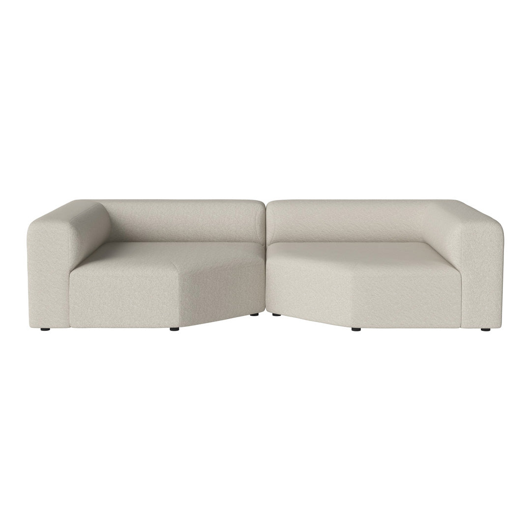 Beige modular sofa with a smooth, minimalist design and no visible patterns. Ideal for modern decor.