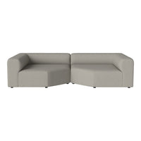 Modern gray sectional sofa with a minimalist design and soft, textured fabric. Perfect for contemporary living spaces.