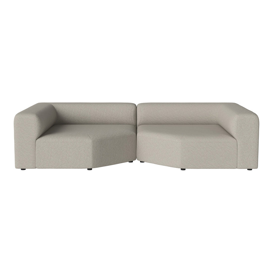 Beige modular sectional sofa with a smooth, minimalist design and no visible patterns. Perfect for modern decor.
