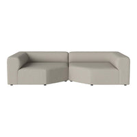 Beige modular sectional sofa with a smooth, minimalist design and no visible patterns. Perfect for modern decor.