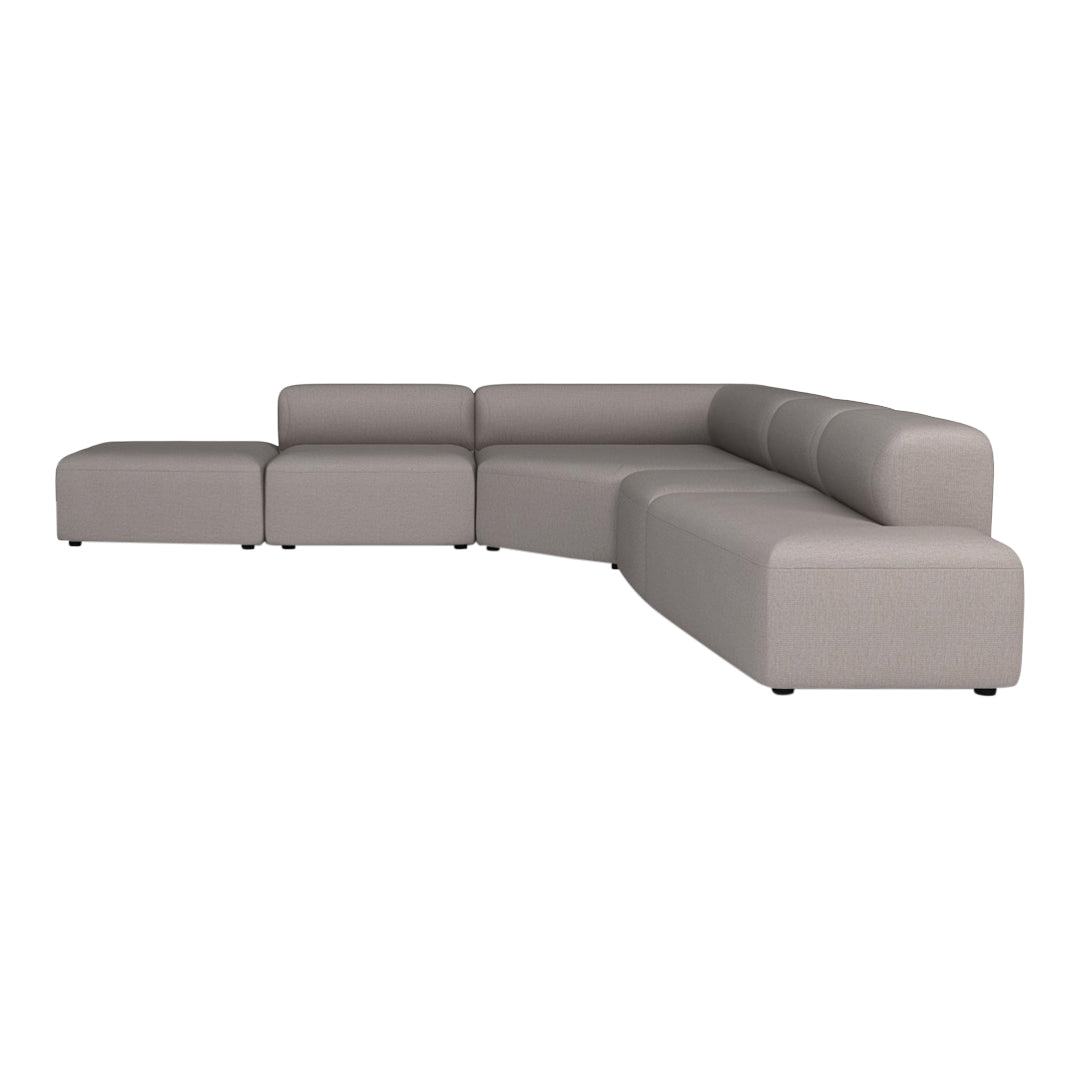 Modern sectional sofa in soft gray with smooth cushions and a minimalist design, perfect for contemporary spaces.
