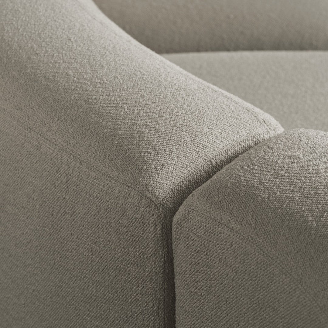 Light gray textured fabric featuring subtle woven patterns for a modern and sophisticated look.