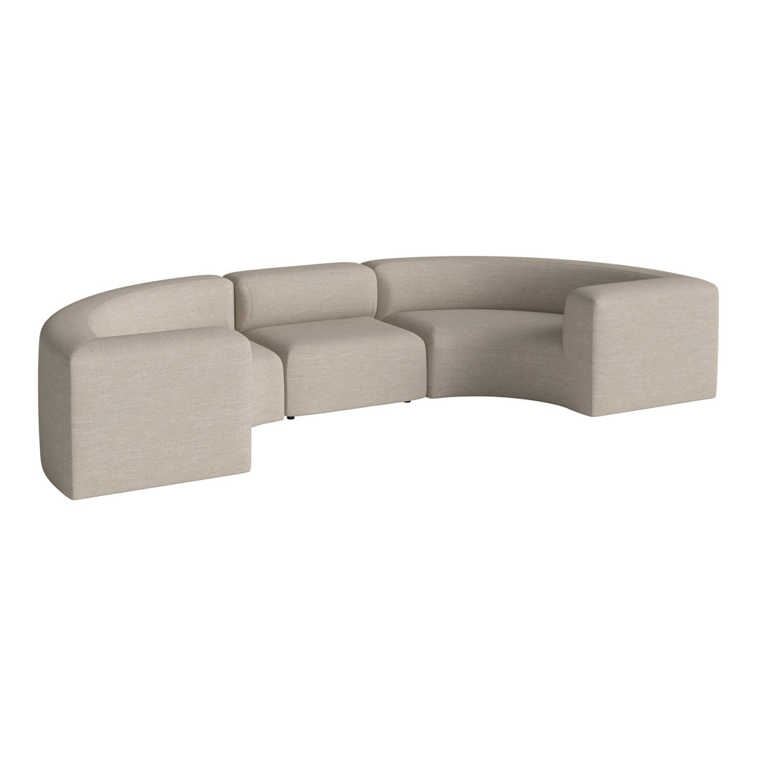Beige curved sofa with a modern design and textured fabric, perfect for contemporary interiors.