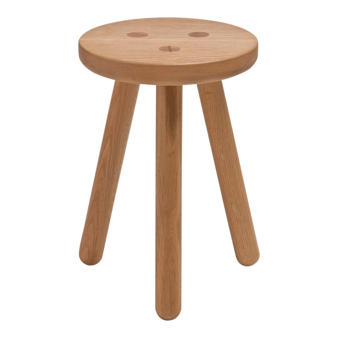 Light brown wooden stool with a round top and three slender legs, featuring a smooth finish and minimalistic design.