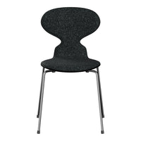Stylish black chair with a sleek, smooth finish and minimalist design, perfect for modern interiors.
