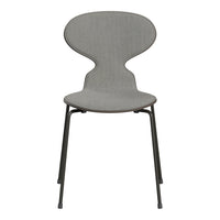 Stylish grey chair with a sleek, modern design and subtle textured fabric pattern. Perfect for contemporary spaces.