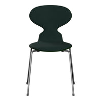 Green molded chair with a smooth finish and chrome legs, featuring an elegant, contemporary design.