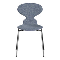 Blue patterned chair with a modern shape, featuring a textured fabric seat and sleek metal legs. Perfect for any space.