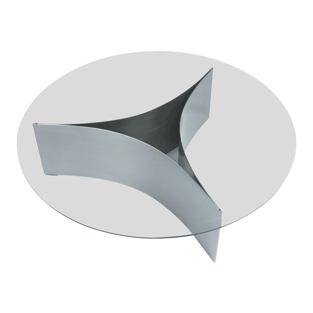 Round glass table with a sleek silver metal base featuring a unique, modern curved design.