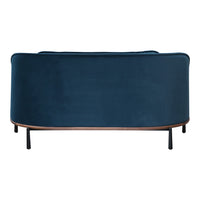 Navy blue velvet sofa with smooth, rounded design and contrasting wooden base. Ideal for modern decor.