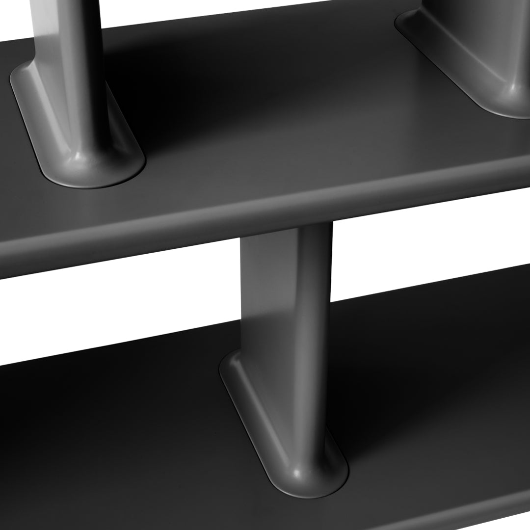 Gray shelving unit with a sleek, modern design, featuring smooth surfaces and minimalist patterns.
