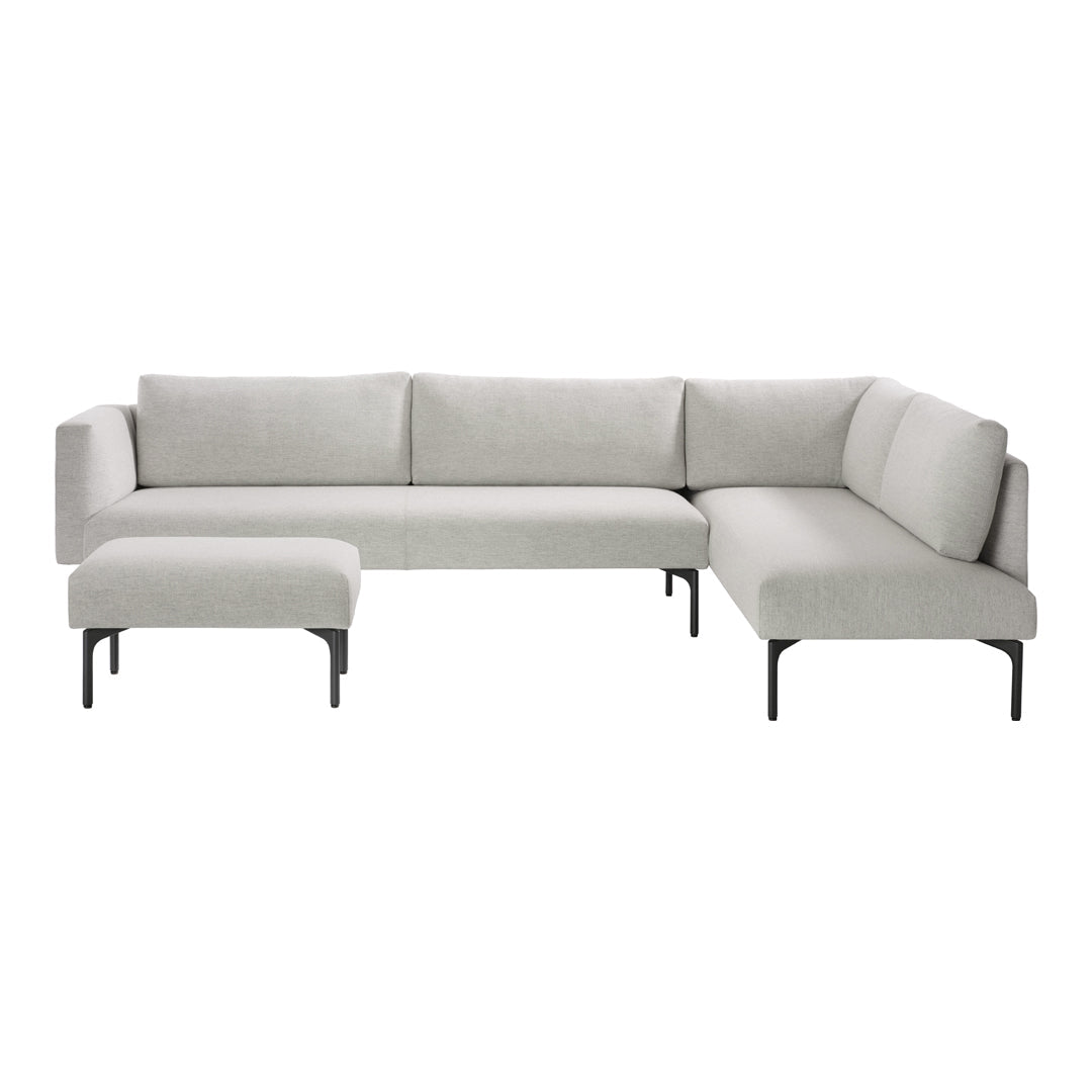Light grey sectional sofa with clean lines and a modern design, featuring solid black metal legs.
