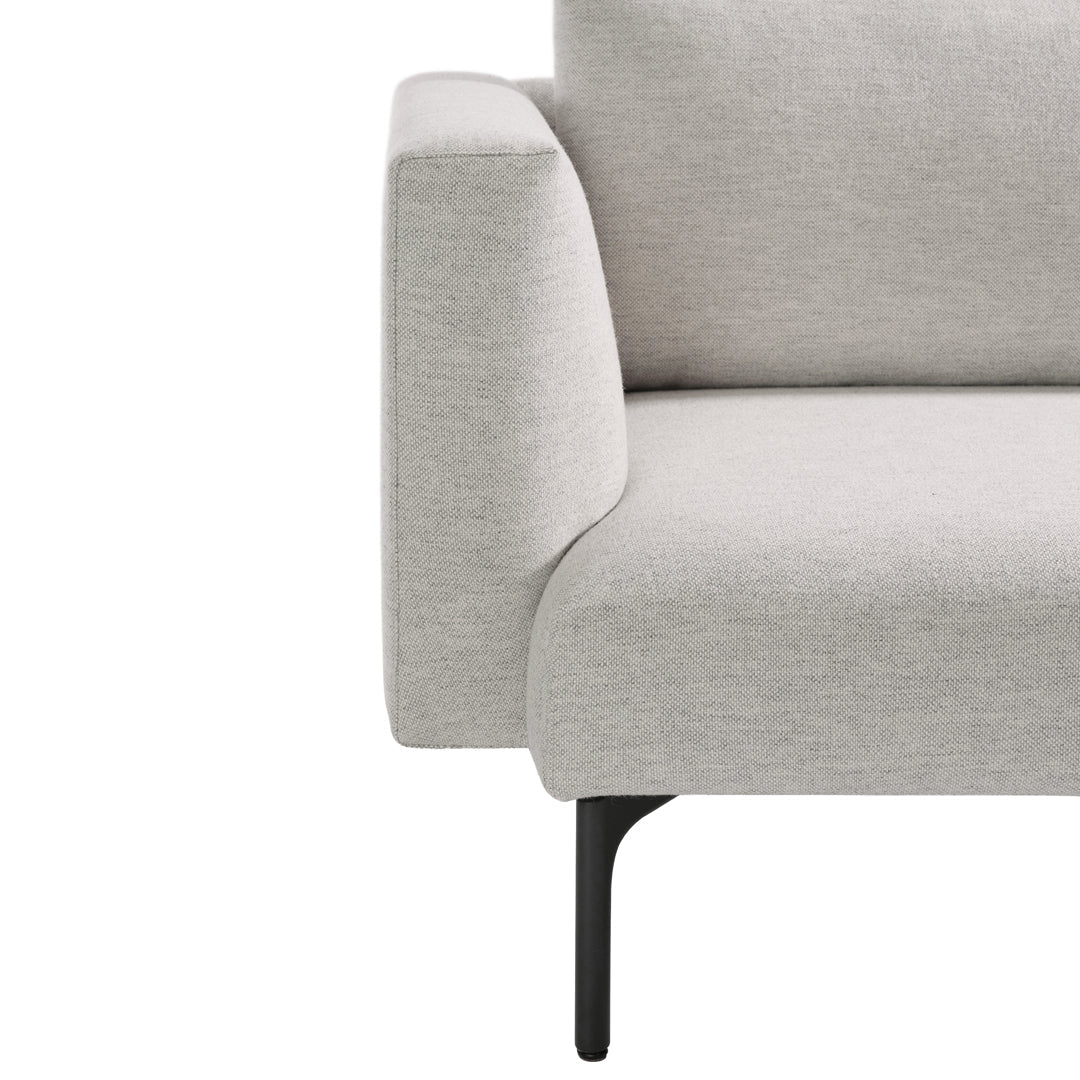 Light gray upholstery sofa with smooth fabric and minimalist armrest design, featuring sleek black legs.