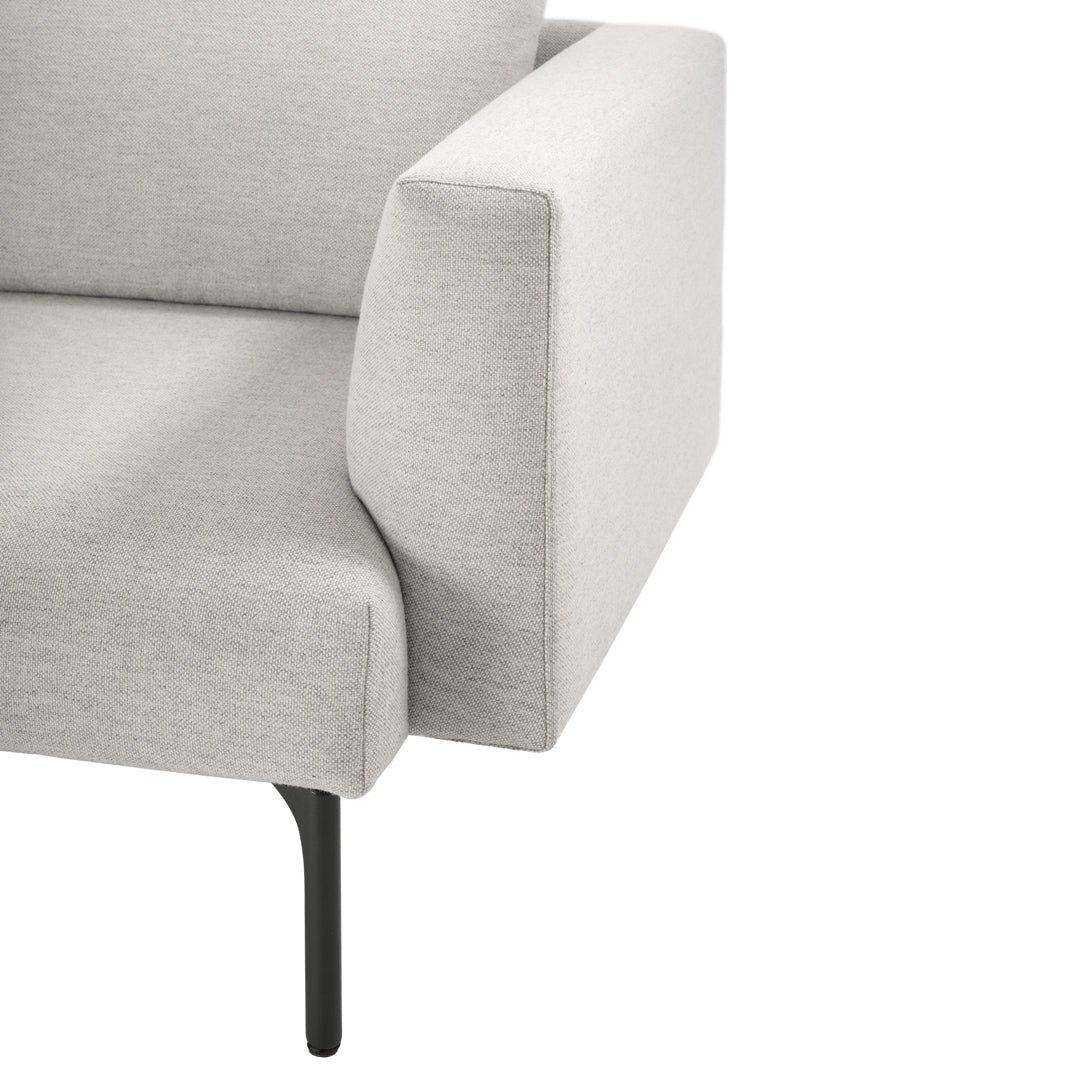 Light gray textured upholstery with a sleek black metal leg, showcasing a modern minimalist design.