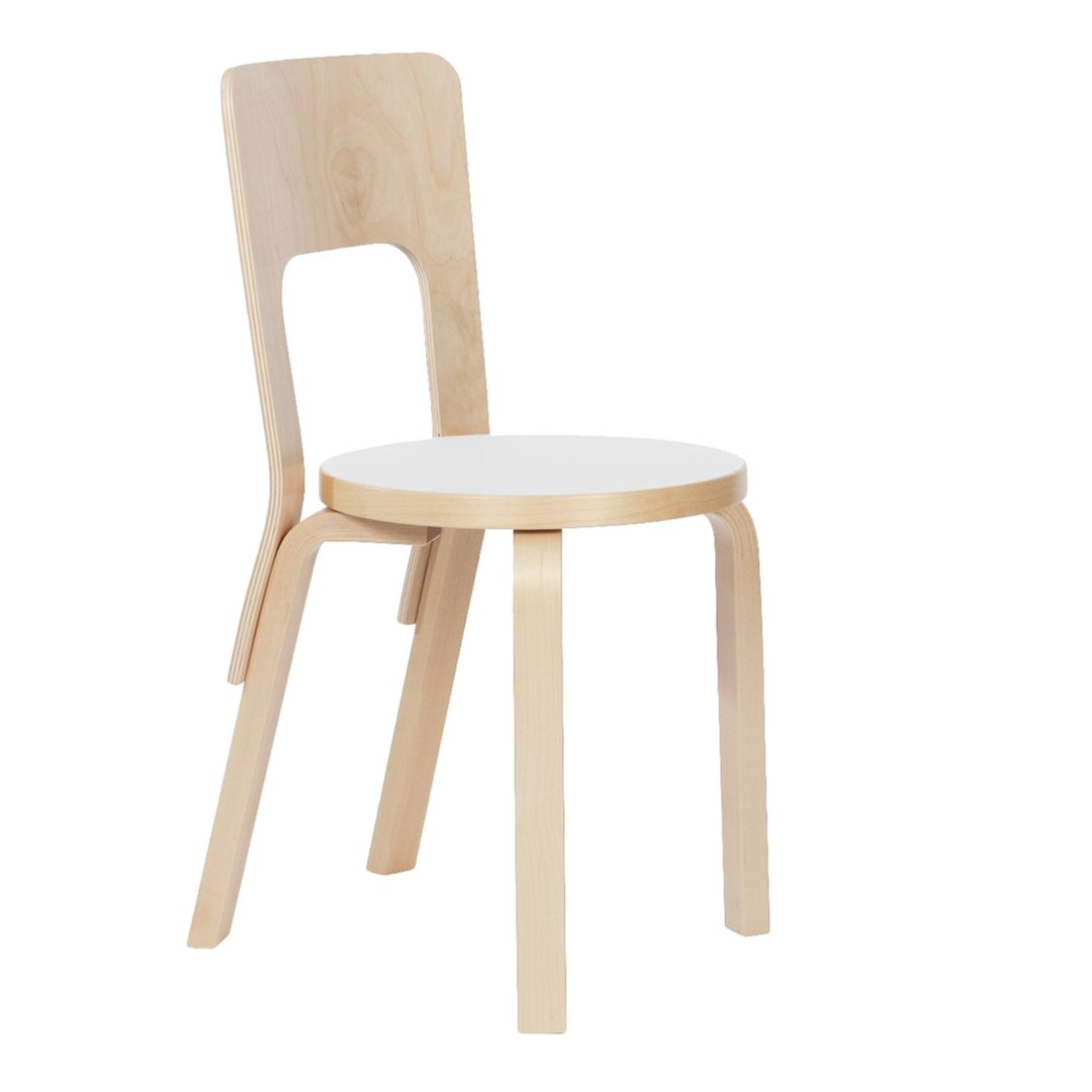 Light wood chair with a smooth white seat and minimalist design, featuring natural grain patterns.