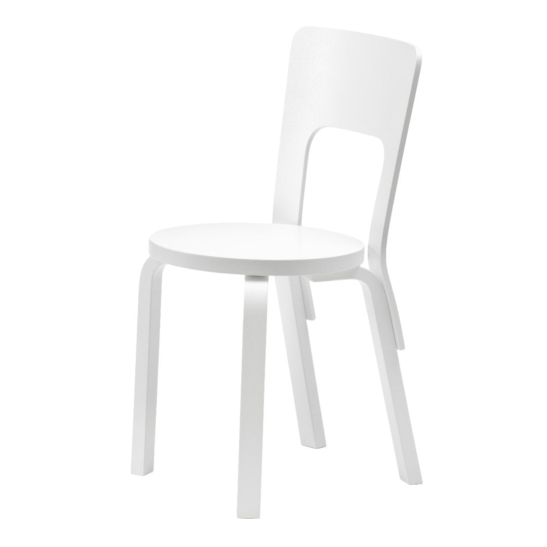 White modern chair with a minimalist design and smooth finish, ideal for contemporary interiors.