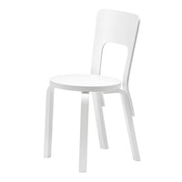 White modern chair with a minimalist design and smooth finish, ideal for contemporary interiors.