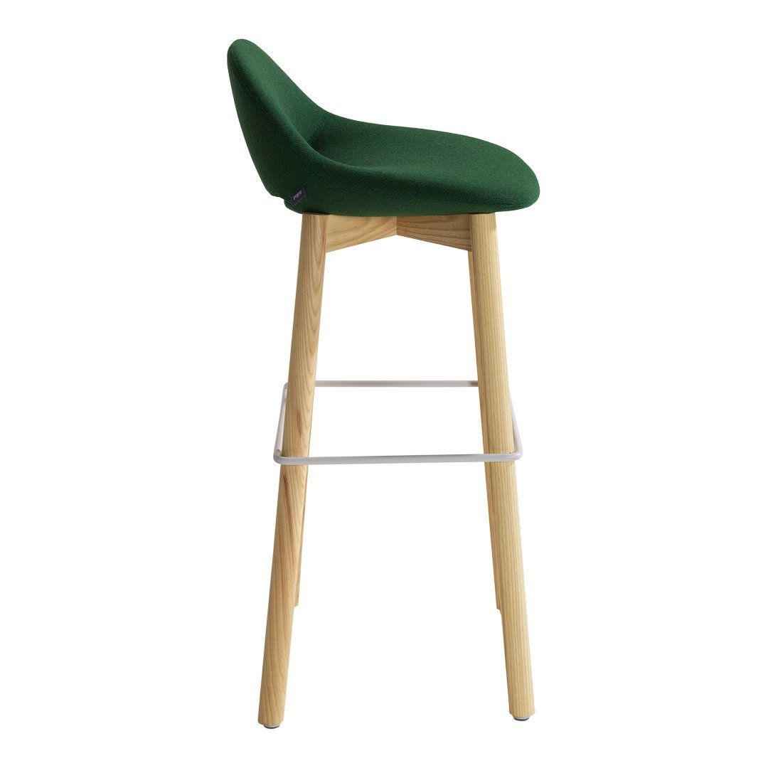 Green upholstered bar stool with natural wood legs and a minimalist design.