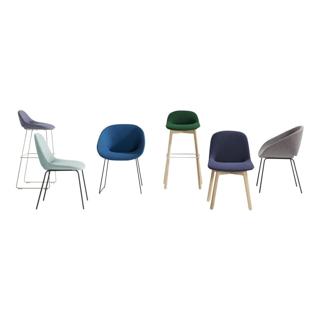 Colorful chairs in shades of green, blue, light blue, gray, and dark blue with sleek metal and wood bases.