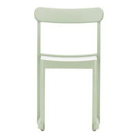 Light green minimalist chair with a smooth finish and simple, modern design, perfect for contemporary spaces.