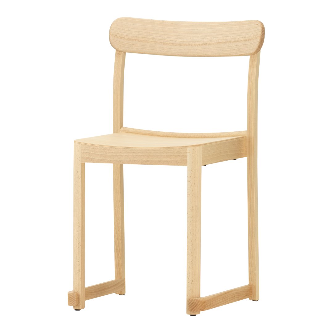 Natural wood chair with a light, minimalist design and smooth, unblemished finish. Ideal for modern interiors.
