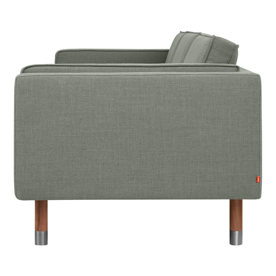 Light grey fabric sofa with simple texture and wooden legs, showcasing a modern minimalist design.