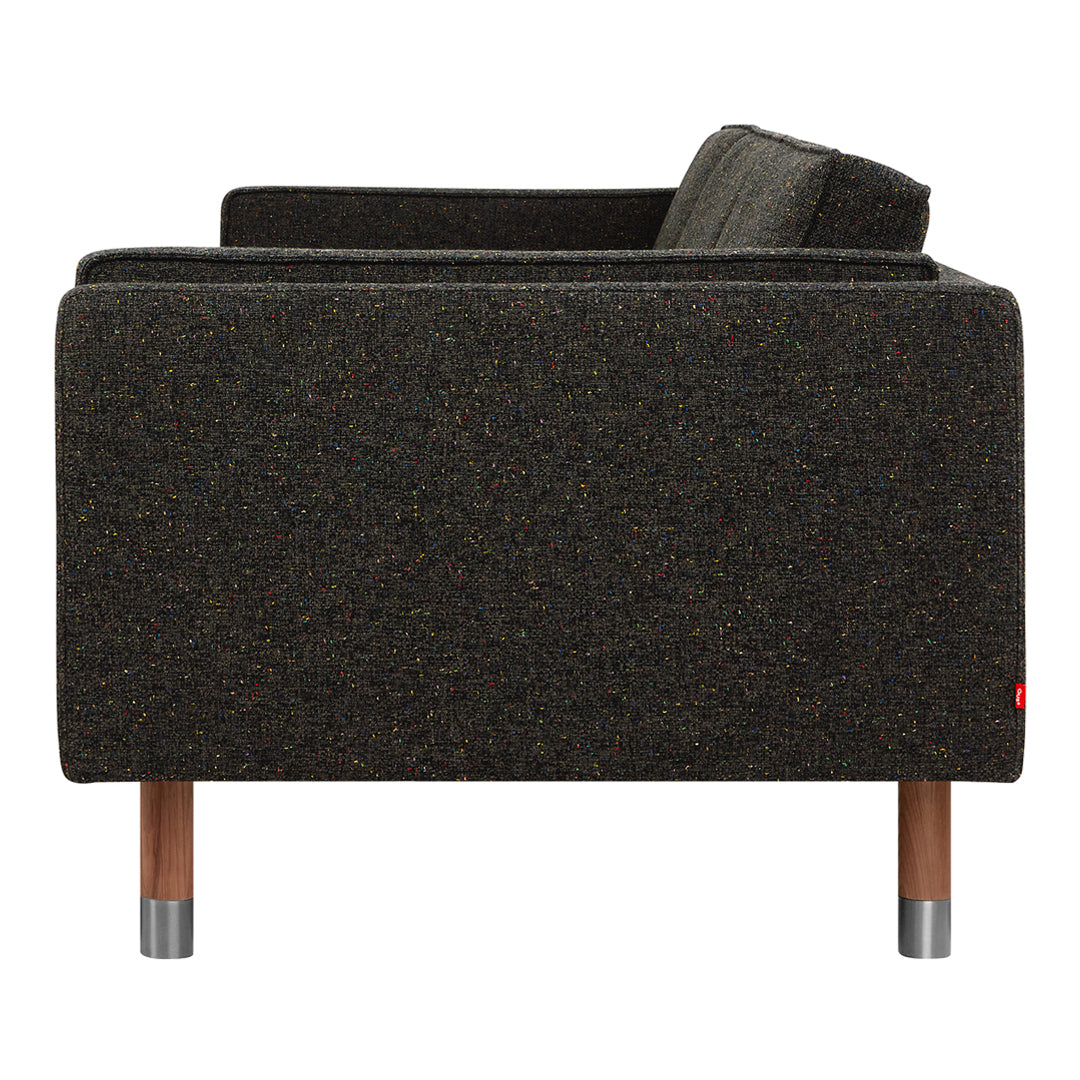 Dark olive green sofa with a subtle textured pattern and natural wood legs. Perfect for modern decor.